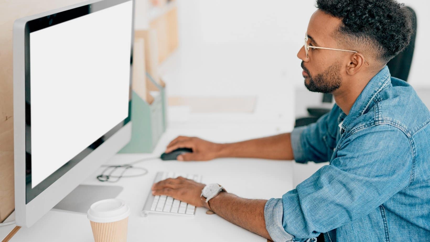 Man at computer side view