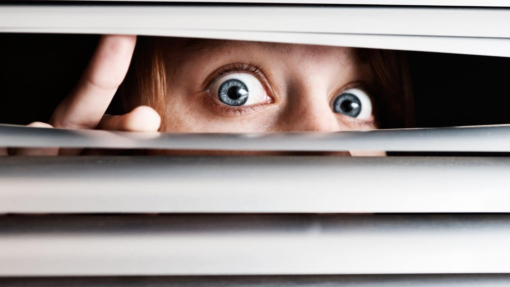 Show your face | Woman peeping through blinds