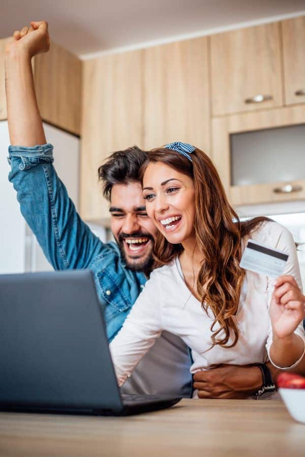 Couple shopping online. Websites optimized for conversions make for great user experiences.