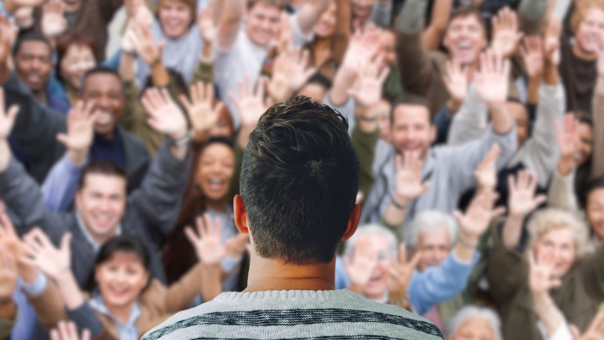 Lead generation. When all your ideal clients say yes! | Person facing crowd.